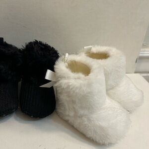 2 pairs of warm cozy fuzzy baby booties ! Perfect for keeping little toes warm